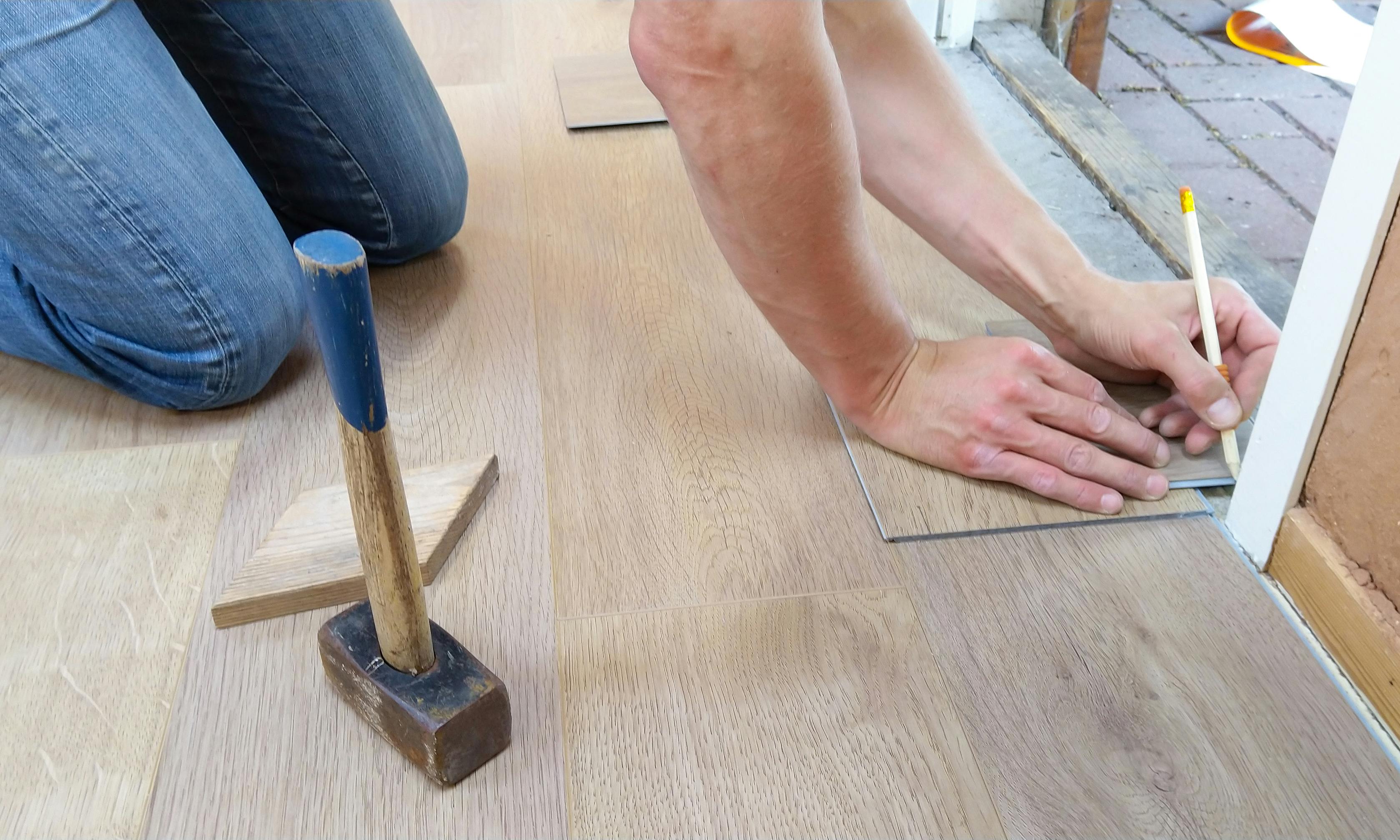 Large format ceramic tile flooring Toronto with rectified edges professional grout lines and trim work