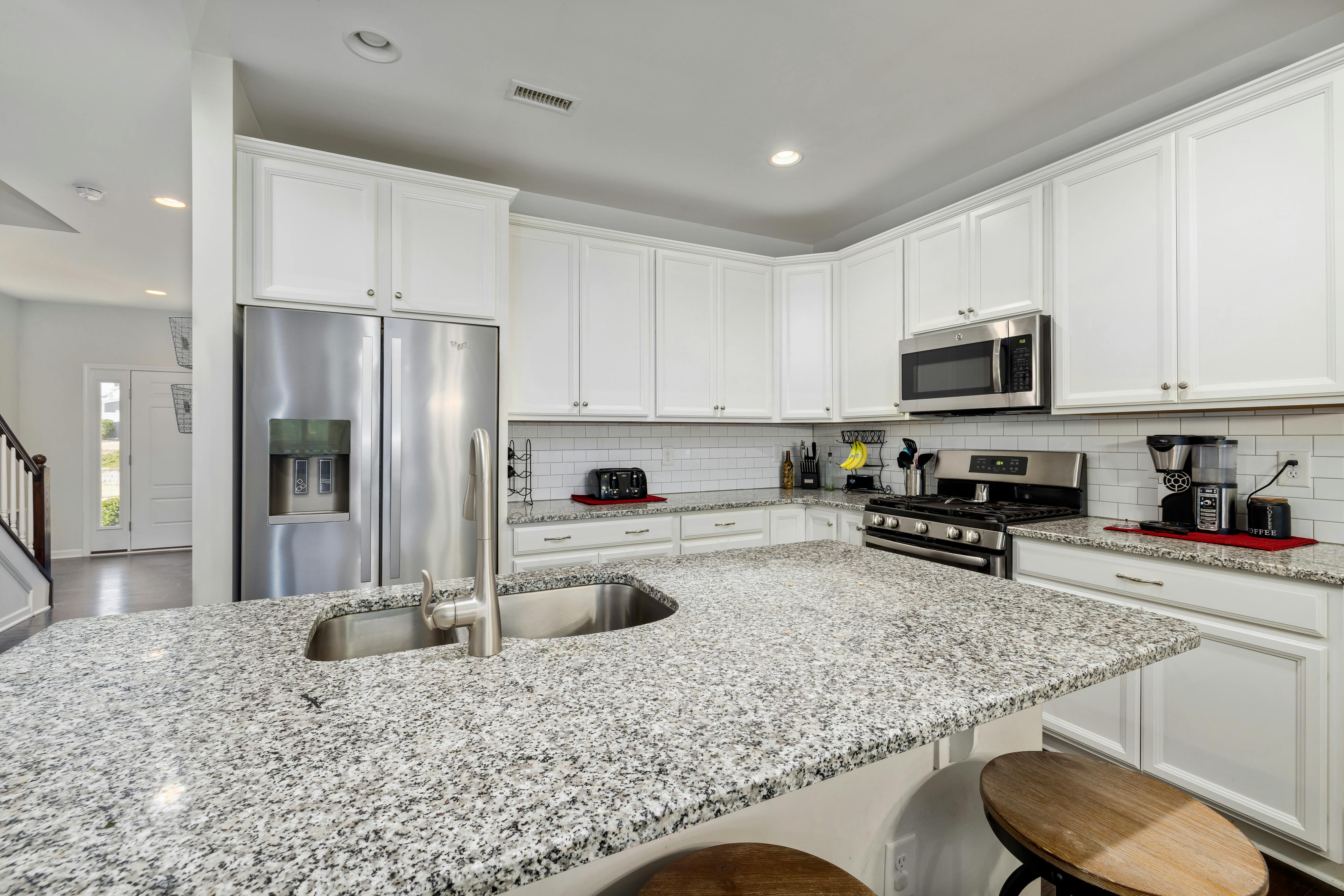 Custom built-in entertainment center Toronto with integrated storage and display